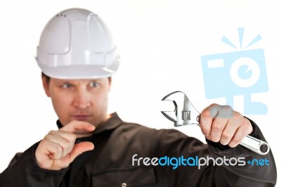 Handyman Wearing Uniform And Hardhat Stock Photo