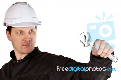 Handyman Wearing Uniform And Hardhat Stock Photo