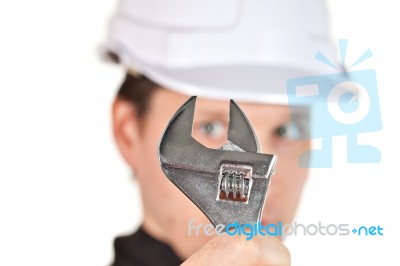 Handyman Wearing Uniform And Hardhat Stock Photo