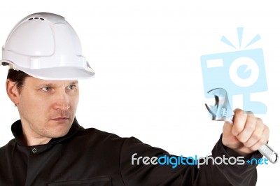 Handyman Wearing Uniform And Hardhat Stock Photo