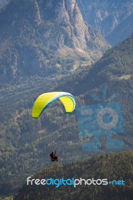 Hang-gliding Above The Countryside Around Zwölferhorn Mountain Stock Photo