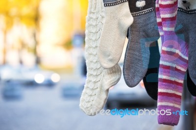 Hanging Handmade Knit Socks Stock Photo