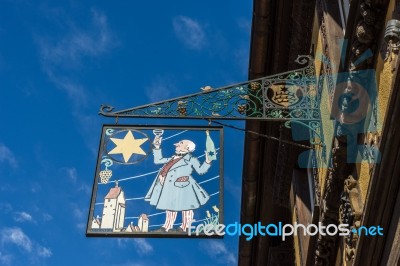 Hanging Sign In Riquewihr In Haut-rhin Alsace France Stock Photo