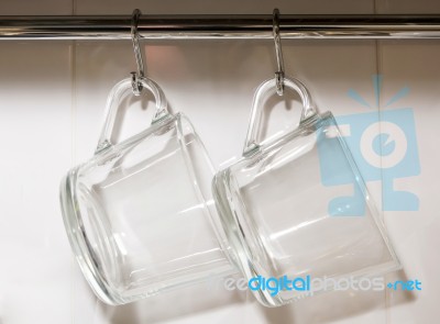 Hanging Transparent Mugs Stock Photo