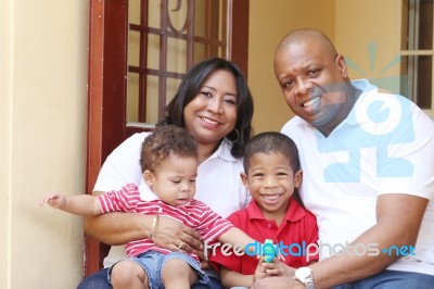 Happy African Family In Their New House Stock Photo