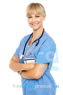 Happy And Confident Doctor Posing Arms Crossed Stock Photo