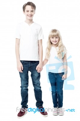 Happy Brother And Sister, Studio Shot Stock Photo