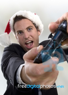 Happy Businessman Playing Video Game Stock Photo