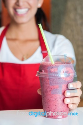 Happy Chef Serving Fresh Shake Stock Photo