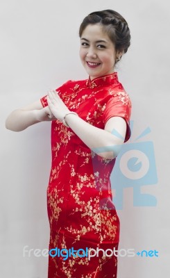 Happy Chinese New Year. Beautiful Asian Woman With Gesture Of Co… Stock Photo