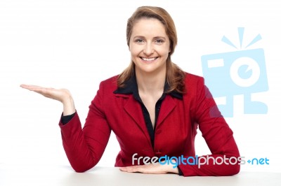 Happy Corporate Woman Presenting Copy Space Stock Photo