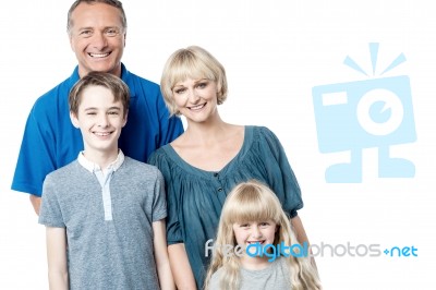 Happy Family Smiling Together Stock Photo