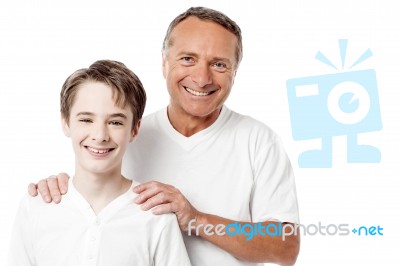 Happy Father And Son Over White Background Stock Photo