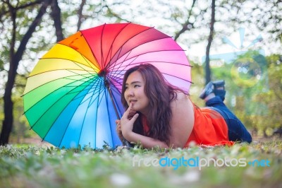Happy Woman With Umbrella Stock Photo