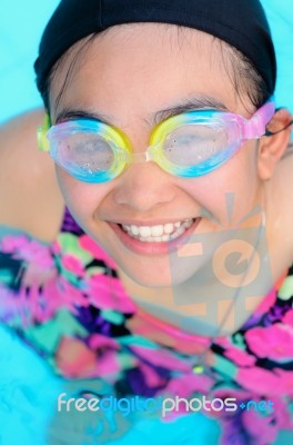 Happy Girl In Swimming Pool Stock Photo