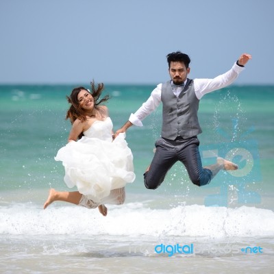 Happy Just Married Young Couple Celebrating And Have Fun At Beau… Stock Photo
