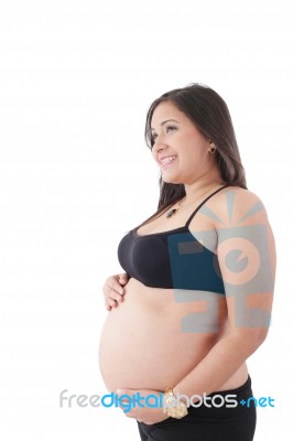 Happy Pregnant Woman Looking To A Copyspace Isolated Stock Photo