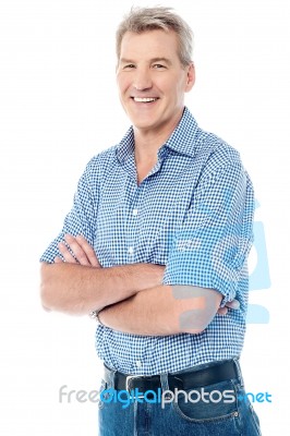 Happy Senior Male Posing Casually Stock Photo
