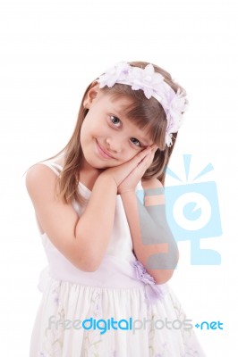 Happy Smiling Little Girl On White Background In Studio Stock Photo
