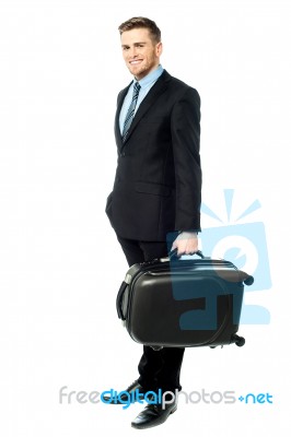 Happy Young Business Man Holding Suitcase Stock Photo