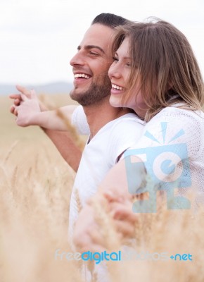 Happy Young Couple Smiling Stock Photo