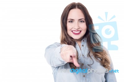 Happy Young Lady Pointing At You Stock Photo