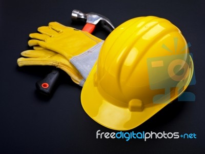 Hard Hat Hammer And Leather Gloves Stock Photo