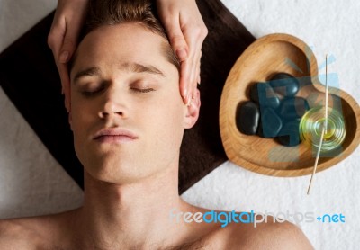 Head Massage On Man In The Spa Stock Photo