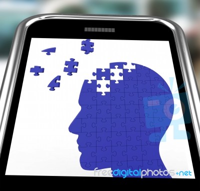 Head Puzzle On Smartphone Shows Smartness Stock Image