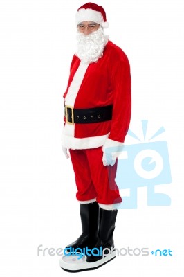 Health Conscious Santa Checking His Weight Stock Photo