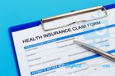 Health Insurance Claim Form With Pen Stock Photo