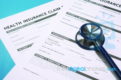 Health Insurance Claim Form With Stethoscope Stock Photo