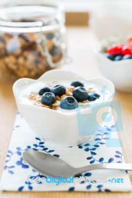 Healthy Breakfast With Granola, Yogurt And Fresh Fruits Stock Photo