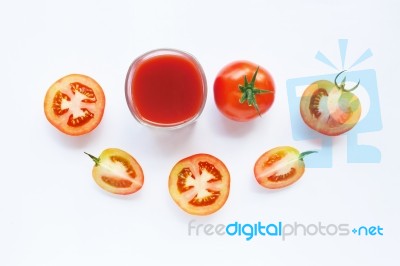 Healthy Drinks. Glass Of Tomato Juice And Pieces Of Fresh Tomato… Stock Photo
