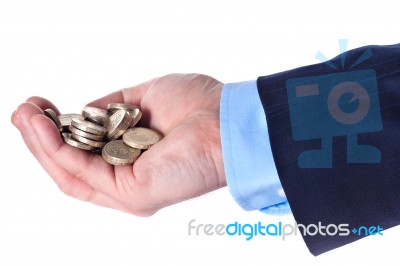 Heap Of British Pound Sterling Coins In The Hand Stock Photo