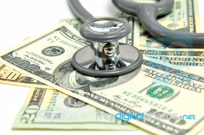 Heap Of Dollars With Stethoscope Stock Photo