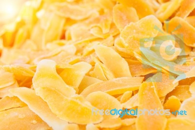 Heap Of Dried Mango Slices On A Hotel Restaurant Buffet Line Stock Photo