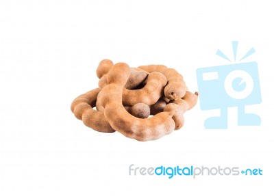 Heap Of Tamarind Fruits Isolated On White,with Clipping Path Stock Photo