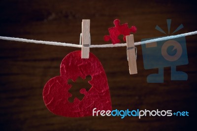 Heart Love Jigsaw On Cloth Rope Stock Photo