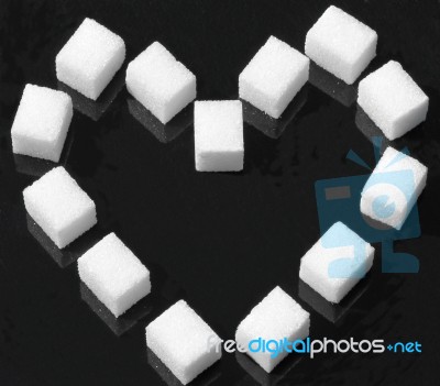 Heart Made By Sugar Lump Stock Photo