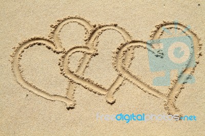 Hearts In The Sand Stock Photo