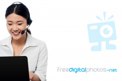 Help Desk Operator Communicating With Client Stock Photo