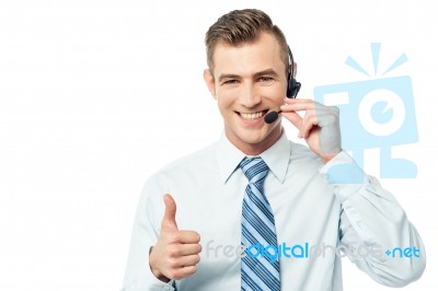 Helpline Operator Showing Thumbs Up Stock Photo