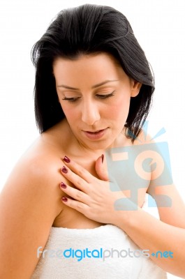 High Angle View Of Female Touching Her Body With White Background Stock Photo