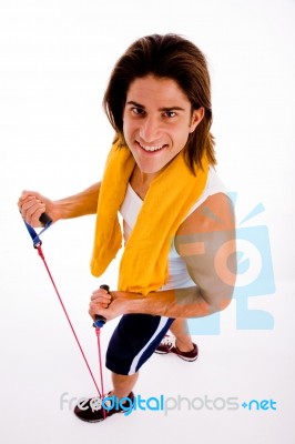 High Angle View Of Man Exercising With Rope Stock Photo