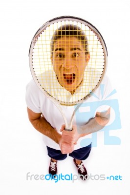 High Angle View Of Shouting Man Carrying Racket Stock Photo