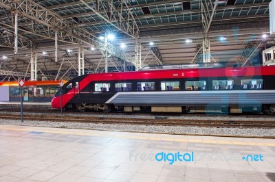 High Speed Train By The Railway Station Stock Photo