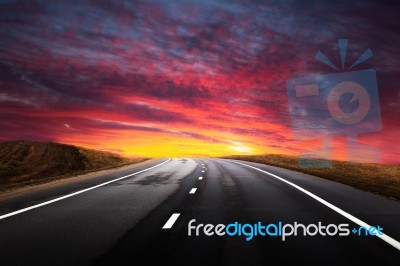 Highway At The Sunset Stock Photo