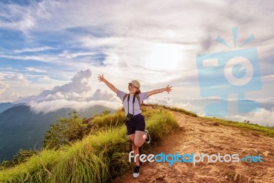 Hiker Girl With Happy On Phu Chi Fa Mountain Stock Photo