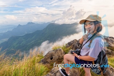 Hiker Girl With Happy On Phu Chi Fa Mountain Stock Photo